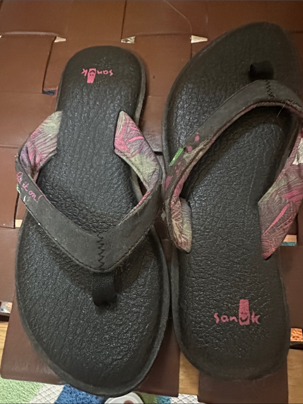 Sanuk Black Flip Flops with Pink and Green Patterned Straps